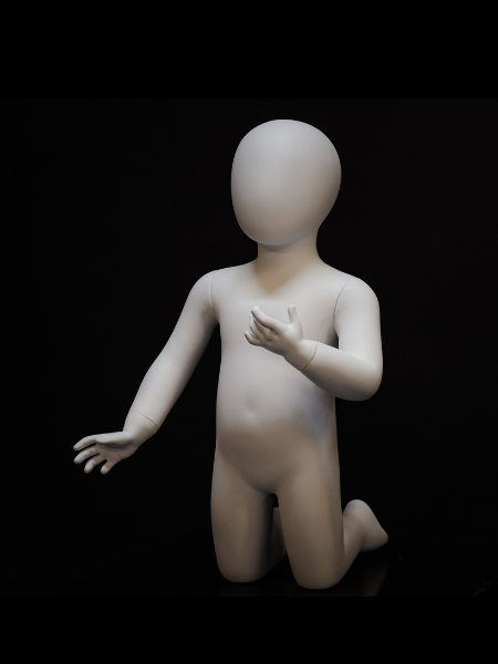 Baby mannequin in a kneeling pose