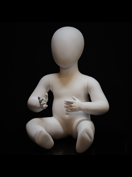 Baby mannequin in a seated pose