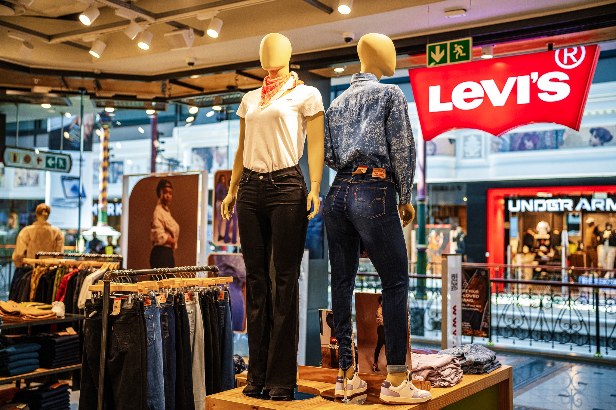 Display mannequins presenting a denim collection